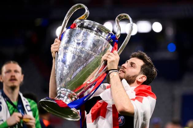 Paris Saint-Germain FC v FC Internazionale - UEFA Champions League Khvicha Kvaratskhelia of Paris Saint-Germain celebrates with the trophy during the UEFA Champions League final football match between Paris Saint-Germain FC and FC Internazionale. Munich Germany Copyright: xNicoloxCampox