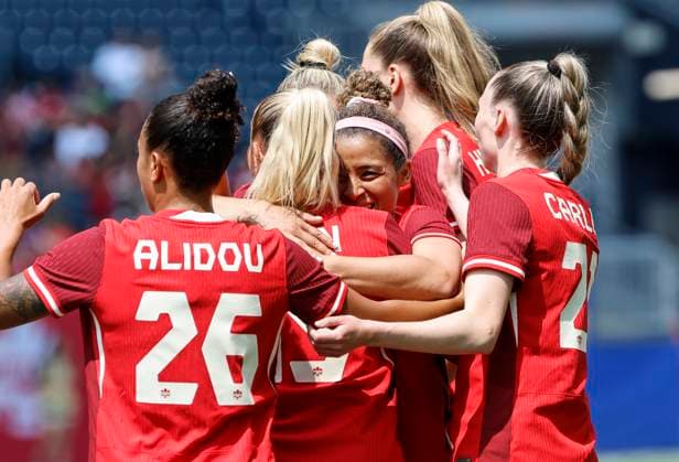 May 31, 2025, Winnipeg, Mb, CANADA: Canada s Desiree Scott (11) embraces Adriana Leon (19) after she scored against Haiti during first half soccer action in Winnipeg, Saturday, May 31, 2025. Haiti Canada Womens Soccer  - ZUMAc35_ 20250531_zaf_c35_078 Copyright: xJohnxWoodsx