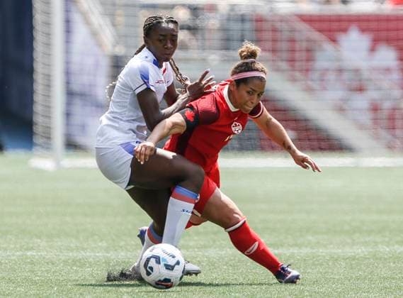 May 31, 2025, Winnipeg, Mb, CANADA: Canada s Desiree Scott (11) attacks against Haiti s Do borah Bien-Aimo (8) during second half soccer action in Winnipeg, Saturday, May 31, 2025. Haiti Canada Womens Soccer  - ZUMAc35_ 20250531_zaf_c35_081 Copyright: xJohnxWoodsx