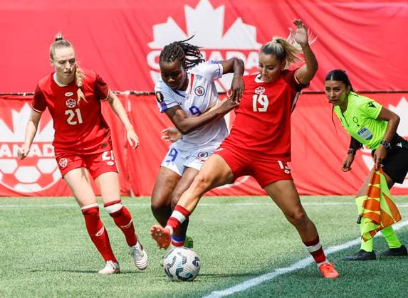 May 31, 2025, Winnipeg, Mb, CANADA: Canada s Adriana Leon (19) and Gabrielle Carle (21) defend against Haiti s Sherly Jeudy (9) during first half soccer action in Winnipeg, Saturday, May 31, 2025. Haiti Canada Womens Soccer  - ZUMAc35_ 20250531_zaf_c35_087 Copyright: xJohnxWoodsx