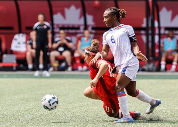May 31, 2025, Winnipeg, Mb, CANADA: Canada s Desiree Scott (11) gets fouled by Haiti s Melchie Dumornay (6) during first half soccer action in Winnipeg, Saturday, May 31, 2025. Haiti Canada Womens Soccer  - ZUMAc35_ 20250531_zaf_c35_096 Copyright: xJohnxWoodsx