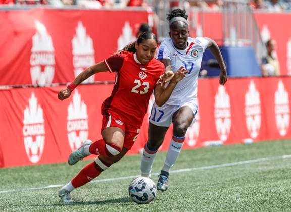 May 31, 2025, Winnipeg, Mb, CANADA: Canada s Olivia Smith (23) makes her way around Haiti s Chelsea Domond (17) during second half soccer action in Winnipeg, Saturday, May 31, 2025. Haiti Canada Womens Soccer  - ZUMAc35_ 20250531_zaf_c35_101 Copyright: xJohnxWoodsx