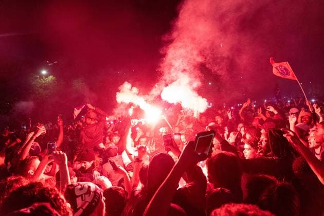 May 31, 2025, Paris, France, FRA: Outside the Parc des Princes, a sea of joy and fireworks: Paris Saint-Germain fans erupt in celebration after their teamÃ¢â‚¬â ¢s stunning 5-0 triumph over Inter Milan in Munich. With this historic victory, PSG becomes only the second French football clubÃ¢â‚¬after Olympique de Marseille in 1993Ã¢â‚¬to lift the UEFA Champions League trophy. A night of chants, flags, and tears of happiness marked a long-awaited moment for supporters across the capital. However, the festivities were marred by clashes between some groups of fans and the police, with several cars set on fire and tensions flaring in the surrounding streets. Paris FRA - ZUMAl224 0821125921st Copyright: xStefanoxLorussox