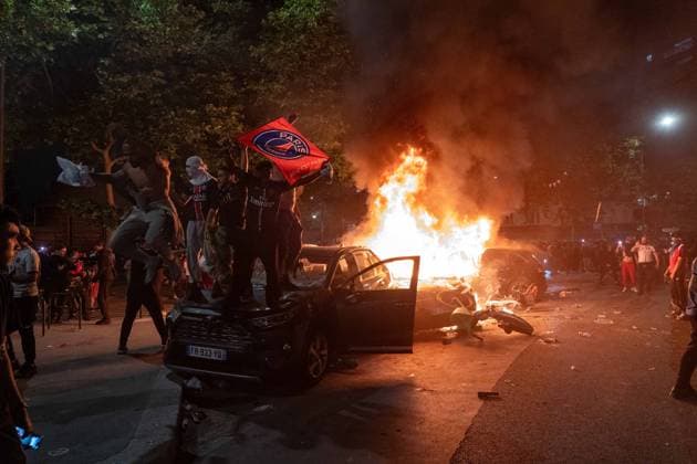 May 31, 2025, Paris, France, FRA: Outside the Parc des Princes, a sea of joy and fireworks: Paris Saint-Germain fans erupt in celebration after their teamÃ¢â‚¬â ¢s stunning 5-0 triumph over Inter Milan in Munich. With this historic victory, PSG becomes only the second French football clubÃ¢â‚¬after Olympique de Marseille in 1993Ã¢â‚¬to lift the UEFA Champions League trophy. A night of chants, flags, and tears of happiness marked a long-awaited moment for supporters across the capital. However, the festivities were marred by clashes between some groups of fans and the police, with several cars set on fire and tensions flaring in the surrounding streets. Paris FRA - ZUMAl224 0821126056st Copyright: xStefanoxLorussox