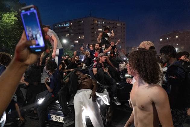 May 31, 2025, Paris, France, FRA: Outside the Parc des Princes, a sea of joy and fireworks: Paris Saint-Germain fans erupt in celebration after their teamÃ¢â‚¬â ¢s stunning 5-0 triumph over Inter Milan in Munich. With this historic victory, PSG becomes only the second French football clubÃ¢â‚¬after Olympique de Marseille in 1993Ã¢â‚¬to lift the UEFA Champions League trophy. A night of chants, flags, and tears of happiness marked a long-awaited moment for supporters across the capital. However, the festivities were marred by clashes between some groups of fans and the police, with several cars set on fire and tensions flaring in the surrounding streets. Paris FRA - ZUMAl224 0821126395st Copyright: xStefanoxLorussox