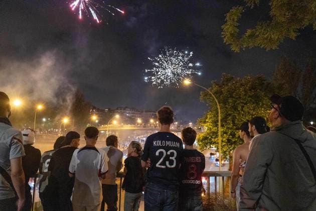 June 1, 2025, Paris, France, FRA: Outside the Parc des Princes, a sea of joy and fireworks: Paris Saint-Germain fans erupt in celebration after their teamÃ¢â‚¬â ¢s stunning 5-0 triumph over Inter Milan in Munich. With this historic victory, PSG becomes only the second French football clubÃ¢â‚¬after Olympique de Marseille in 1993Ã¢â‚¬to lift the UEFA Champions League trophy. A night of chants, flags, and tears of happiness marked a long-awaited moment for supporters across the capital. However, the festivities were marred by clashes between some groups of fans and the police, with several cars set on fire and tensions flaring in the surrounding streets. Paris FRA - ZUMAl224 0821126400st Copyright: xStefanoxLorussox
