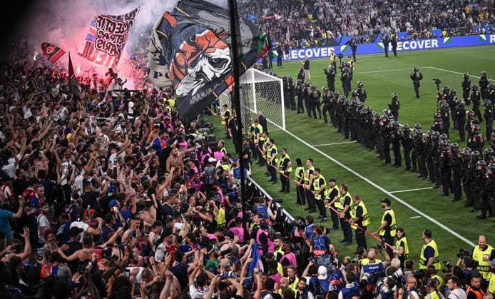Football CHL FINAL 2024 2025 Final in Munich 31 05 2025 Paris Saint Germain Inter Milan A hundred police officers stand on the pitch of the arena in Munich after the match Paris Saint Germain fans celebrate winning the Champions League