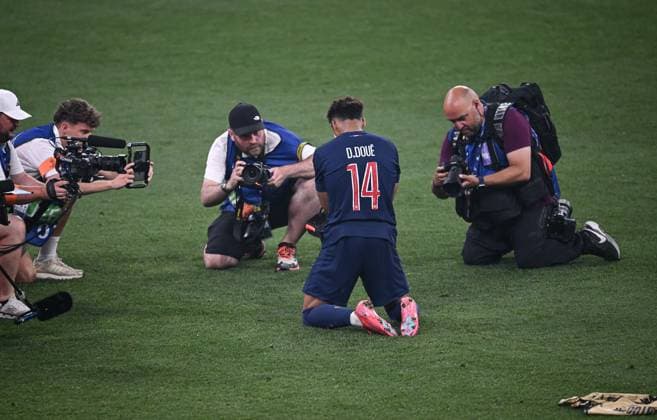Football CHL FINAL 2024 2025 Final in Munich 31 05 2025 Paris Saint 5 0 Germain Inter Milan FINAL CELEBRATION Paris Saint Germain two-goal scorer Desire Doue center surrounded by photographers after the match