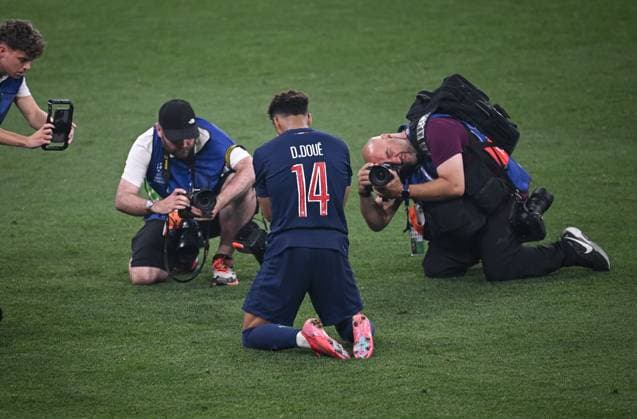 Football CHL FINAL 2024 2025 Final in Munich 31 05 2025 Paris Saint 5 0 Germain Inter Milan FINAL CELEBRATION Paris Saint Germain two-goal scorer Desire Doue center surrounded by photographers after the match