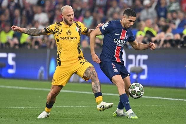 Federico DIMARCO Milan , action,duel against Achraf Hakimi PSG Football UEFA Champions League Final Paris Saint Germain PSG Inter Milan 5 0, on 31 05 2025 Munich Football Arena,