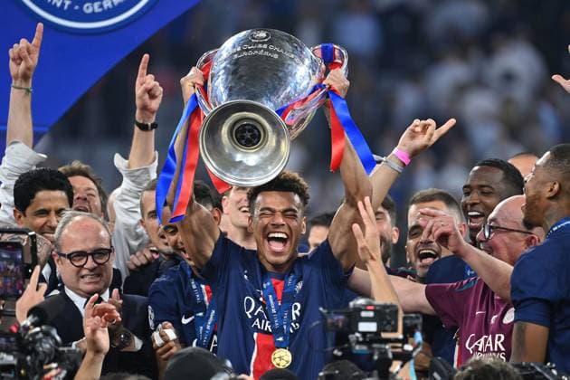 Player,team photo,team,team,team photo Desire Doue PSG with trophy,cup,trophaee, jubilation,joy,enthusiasm, award ceremony, football UEFA Champions League final Paris Saint Germain PSG Inter Milan 5 0, on 31 05 2025 Munich Football Arena,