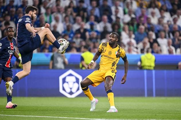 Khvicha Kvaratskhelia Paris Saint Germain and Marcus Thuram FC Internazionale Milano battle for the ball during the UEFA Champions League Final 2025 between Paris Saint Germain and FC Internazionale Milano at Munich Football Arena on May 31, 2025 in Munich, Germany Photo by Harry Langer DeFodi Images