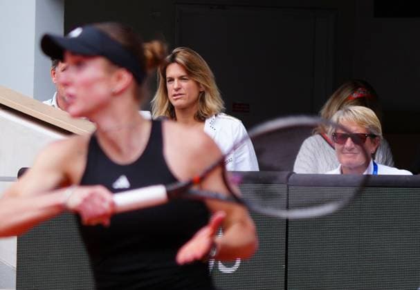 Tournament Director Amelie Mauresmo looks on as Elina Svitolina plays a forehand during her fourth round match against Jasmine Paolini which was first up on Philippe Chatrier Court. A match that went to three sets and lasted nearly three and a half hours French Open Tennis, Day Eight, Tennis, Roland Garros, Paris, France - 01 Jun 2025 EDITORIAL USE ONLY No use with unauthorised audio, video, data, fixture lists, club league logos or live services. Online in-match use limited to 120 images, no video emulation. No use in betting, games or single club league player publications.  Copyright: xJavierxGarcia Shutterstockx 15334656ab