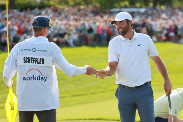 The Memorial Tournament Scottie Scheffler of the United States celebrates his putt on the 18th with his caddie during the final round of The Memorial Tournament presented by Workday at Muirfield Village Golf Club in Dublin, Ohio, USA on Sunday, June 1, 2025. Dublin Ohio United States  Copyright: xJorgexLemusx originalFilename:lemus-thememor250601_npcyF.jpg
