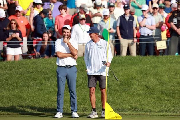 Memorial Tournament presented by Workday Scottie Scheffler of Dallas, Texas talks with his caddie on the 18th green after his back-to-back win at the conclusion of the final round of the Memorial Tournament presented by Workday at Muirfield Village Golf Club on Sunday, June 1, 2025 in Dublin, Ohio. Dublin Ohio United States  Copyright: xAmyxLemusx originalFilename:lemus-memorial250601_npi57.jpg