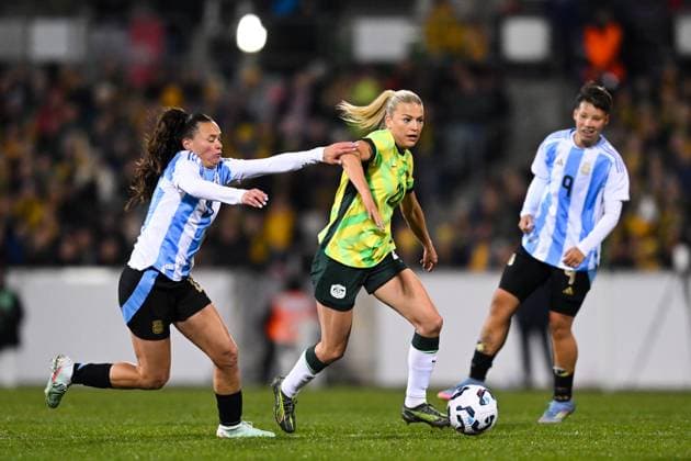 SOCCER AUSTRALIA ARGENTINA, Charlotte Grant of Australia is tackled during the Women s friendly international soccer match between Australia and Argentina at GIO Stadium in Canberra, Monday, June 2, 2025. ( NO ARCHIVING, EDITORIAL USE ONLY CANBERRA AUSTRALIAN CAPITAL TERRITORY AUSTRALIA  Copyright: xLUKASxCOCHx 20250602196213213760