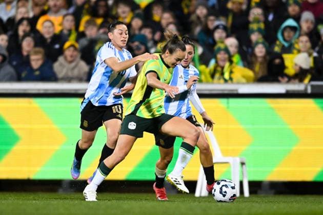 SOCCER AUSTRALIA ARGENTINA, Caitlin Foord of Australia is tackled by Maricel Pereyra of Argentina during the Women s friendly international soccer match between Australia and Argentina at GIO Stadium in Canberra, Monday, June 2, 2025. ( NO ARCHIVING, EDITORIAL USE ONLY CANBERRA AUSTRALIAN CAPITAL TERRITORY AUSTRALIA  Copyright: xLUKASxCOCHx 20250602112972467827