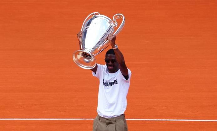 PSG player Ousmane Dembele with the Champions League Trophy on Court Philippe Chatrier French Open Tennis, Day Nine, Tennis, Roland Garros, Paris, France - 02 Jun 2025 EDITORIAL USE ONLY No use with unauthorised audio, video, data, fixture lists, club league logos or live services. Online in-match use limited to 120 images, no video emulation. No use in betting, games or single club league player publications. Copyright: xJavierxGarcia Shutterstockx 15335297bj