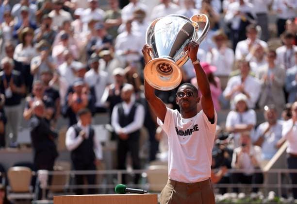 Ousmane Dembele of PSG brings out the Champions League trophy onto Court Philippe Chatrier French Open Tennis, Day Nine, Tennis, Roland Garros, Paris, France - 02 Jun 2025 EDITORIAL USE ONLY No use with unauthorised audio, video, data, fixture lists, club league logos or live services. Online in-match use limited to 120 images, no video emulation. No use in betting, games or single club league player publications. Copyright: xEllaxLing Shutterstockx 15335296e