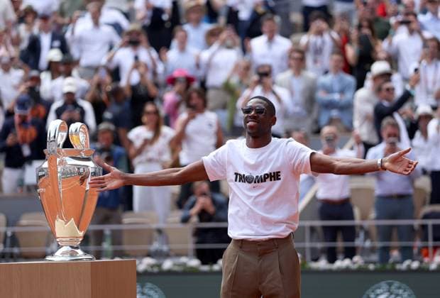 Ousmane Dembele of PSG brings out the Champions League trophy onto Court Philippe Chatrier French Open Tennis, Day Nine, Tennis, Roland Garros, Paris, France - 02 Jun 2025 EDITORIAL USE ONLY No use with unauthorised audio, video, data, fixture lists, club league logos or live services. Online in-match use limited to 120 images, no video emulation. No use in betting, games or single club league player publications. Copyright: xEllaxLing Shutterstockx 15335296f