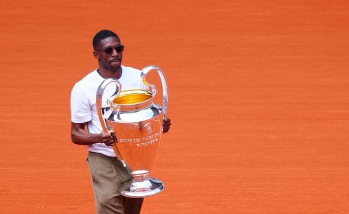 Ousmane Dembele parades the Champions League trophy on to Philippe Chatrier Court French Open Tennis, Day Nine, Tennis, Roland Garros, Paris, France - 02 Jun 2025 EDITORIAL USE ONLY No use with unauthorised audio, video, data, fixture lists, club league logos or live services. Online in-match use limited to 120 images, no video emulation. No use in betting, games or single club league player publications. Copyright: xJavierxGarcia Shutterstockx 15335297em