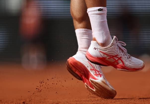 (250603) -- PARIS, June 3, 2025 -- The shoes of Novak Djokovic of Serbia are seen during the men s singles 4th round match against Cameron Norrie of Britain at the French Open tennis tournament at Roland Garros, Paris, France, June 2, 2025. ) (SP)FRANCE-PARIS-TENNIS-FRENCH OPEN-MEN S SINGLES LixJing 