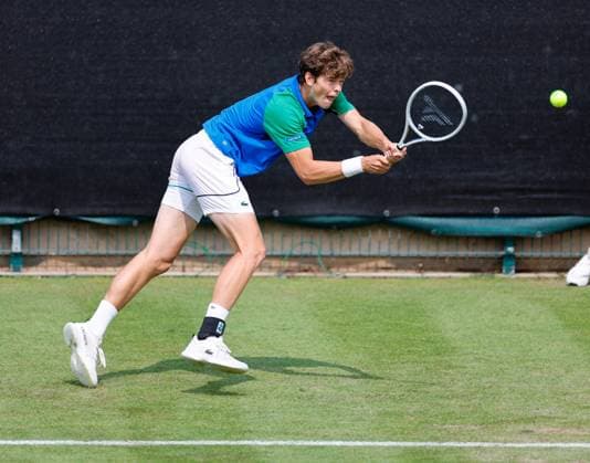 3rd June 2025; Edgbaston Priory Club, Birmingham, England: Lexus Birmingham Open Tennis, Day 2; Alexander Blockx (BEL) running backhand in his mens singles match against Yosuke Watanuki (JPN)  ActionPlus12797797 RogerxEvans