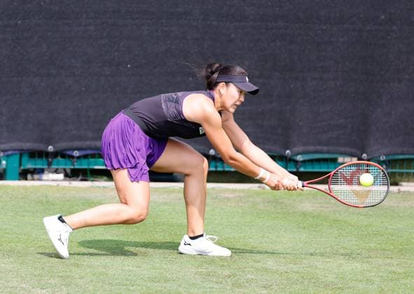 3rd June 2025; Edgbaston Priory Club, Birmingham, England: Lexus Birmingham Open Tennis, Day 2; Sayaka Ishii (JPN) low backhand in her womens singles match against Sijia Wei (CHN)  ActionPlus12797806 RogerxEvans