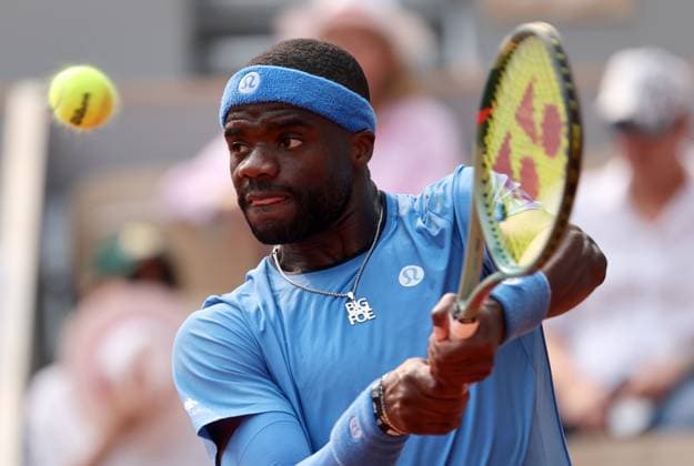 Frances Tiafoe of the United States plays against Lorenzo Musetti of Italy during their quarterfinal match of the French Tennis Open in Roland Garros in Paris, France, on Tuesday, June 3, 2025. Musetti won 6-2, 4-6, 7-5, 6-2.  PAR20250603206 MAYAxVIDON-WHITE