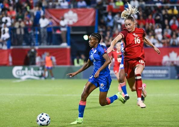 June 3, 2025, Montreal, Pq, Canada: Haiti s Roseline Eloissaint (11) gets by Canada s Janine Sonis (16) during second half international soccer action in Montreal, Tuesday, June 3, 2025. Roseline Eloissaint, Janine Sonis,  - ZUMAc35_ 20250603_zaf_c35_102 Copyright: xGrahamxHughesx