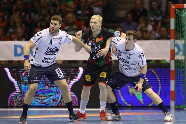 04 06 2025, xtgx, Handball, Daikin HBL, SC Magdeburg SG Flensburg Handewitt v l Johannes Golla Flensburg, 4 , Magnus Saugstrup Magdeburg, 23 , Lukas Jorgensen Jörgensen, Flensburg, 25 duel, duel, fight, tackle Magdeburg