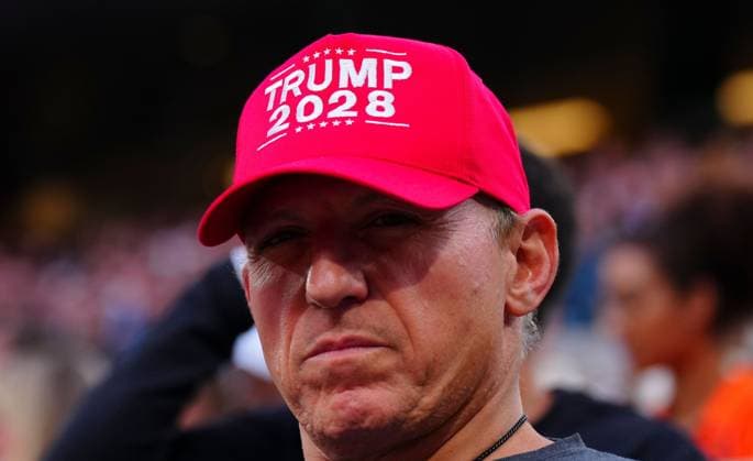 A spectator wearing a Trump 2028 baseball cap during the match between Novak Djokovic and Alexander Zverev despite the constitution ruling that no US President can serve a third term French Open Tennis, Day Eleven, Tennis, Roland Garros, Paris, France - 04 Jun 2025 EDITORIAL USE ONLY No use with unauthorised audio, video, data, fixture lists, club league logos or live services. Online in-match use limited to 120 images, no video emulation. No use in betting, games or single club league player publications. Copyright: xJavierxGarcia Shutterstockx 15337990ec