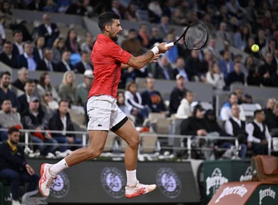 2025 Roland-Garros - Day 11 PARIS, FRANCE - JUNE 04: Novak Djokovic of Serbia and Alexander Zverev (not seen) of Germany compete during the Men s Singles Quarter Final match on Day Eleven of the 2025 French Open at Roland Garros on June 04, 2025 in Paris, France. Burak Akbulut Anadolu Paris France. Editorial use only. Please get in touch for any other usage.  Copyright: x2025xAnadoluxBurakxAkbulutx