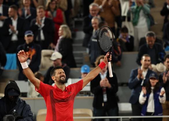 (250605) -- PARIS, June 5, 2025 -- Novak Djokovic celebrates after winning the men s singles quarterfinal match between Alexander Zverev of Germany and Novak Djokovic of Serbia at the French Open tennis tournament at Roland Garros, Paris, France, June 4, 2025. ) (SP)FRANCE-PARIS-TENNIS-FRENCH OPEN-MEN S SINGLES-QUARTERFINAL LixJing 