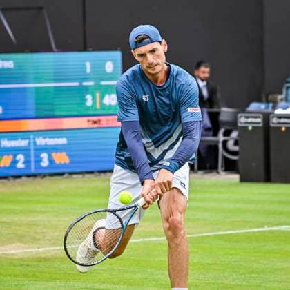 5th June 2025; Edgbaston Priory Club, Birmingham, England: Lexus Birmingham Open Tennis, Day 4; Marc-Andre Huesler (SUI) hits a volley in the match against Otto Virtanen (FIN)  ActionPlus12798333 GodfreyxPitt