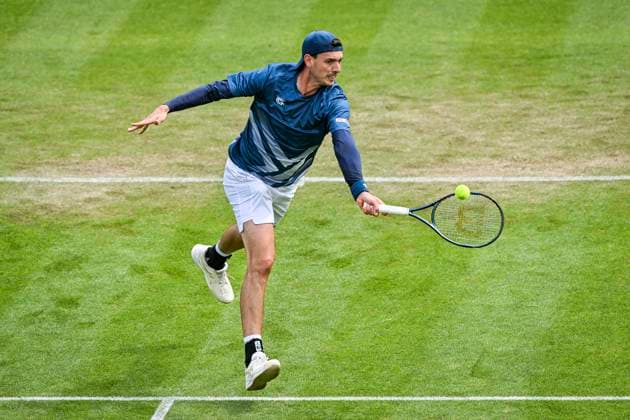 5th June 2025; Edgbaston Priory Club, Birmingham, England: Lexus Birmingham Open Tennis, Day 4; Marc-Andre Huesler (SUI) hits a volley in the match against Otto Virtanen (FIN)  ActionPlus12798360 GodfreyxPitt