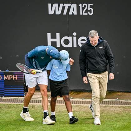 5th June 2025; Edgbaston Priory Club, Birmingham, England: Lexus Birmingham Open Tennis, Day 4; Marc-Andre Huesler (SUI) consoles a ballboy who was hit by a flying ball  ActionPlus12798367 GodfreyxPitt