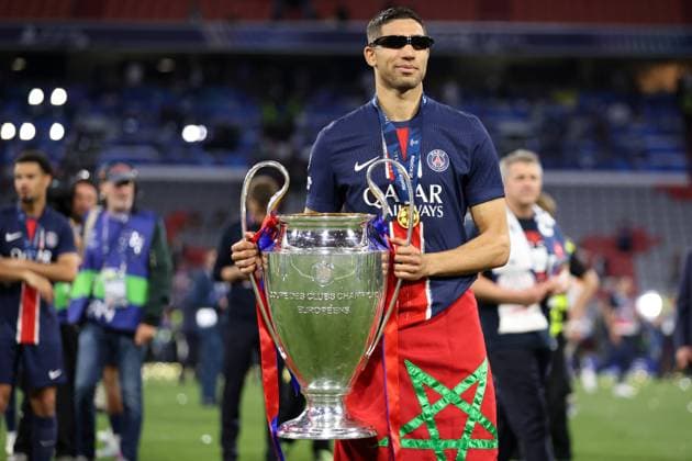 Paris Saint-Germain v FC Internazionale Milano - UEFA Champions League Final 2025 Achraf Hakimi of Paris Saint-Germain Fc celebrates winning the Uefa Champions League with the trophy at the end the UEFA Champions League Final 2025 match between Paris Saint-Germain Fc and Fc Internazionale Milano at Munich Football Arena on May 31, 2025 in Munich, Germany. Munich Munich Football Arena Germany Copyright: xMarcoxCanonierox