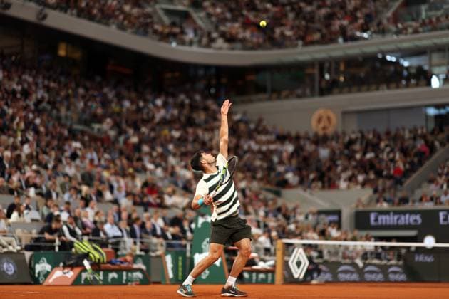 Carlos Alcaraz of Spain plays against Lorenzo Musetti of Italy during their semi-final match at the French Tennis Open at Roland Garros in Paris, France, on Friday, June 6, 2025. Alcaraz advanced to the final after Musetti withdrew due to an injury in the fourth set.  PAR20250606105 MAYAxVIDON-WHITE