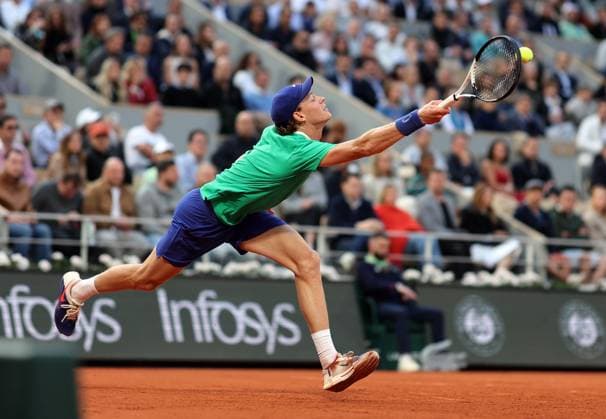 Top-seeded Jannik Sinner of Italy plays against Serb Novak Djokovic during their semi-final match at the French Tennis Open in Roland Garros in Paris, France, on Friday, June 6, 2025. Sinner won 6-4, 7-5, 7-6 and advanced to the final.  PAR20250607202 MAYAxVIDON-WHITE