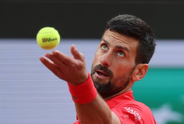 Serb Novak Djokovic plays against top-seeded Jannik Sinner of Italy during their semi-final match at the French Tennis Open in Roland Garros in Paris, France, on Friday, June 6, 2025. Sinner won 6-4, 7-5, 7-6 and advanced to the final.  PAR20250607233 MAYAxVIDON-WHITE