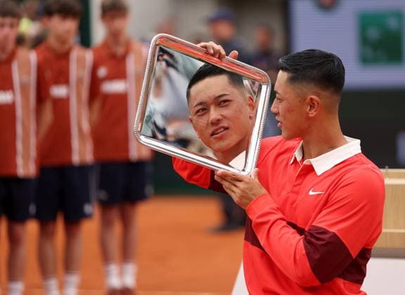 Tokito Oda of Japan poses with the trophy French Open Tennis, Day Fourteen, Tennis, Roland Garros, Paris, France - 07 Jun 2025 EDITORIAL USE ONLY No use with unauthorised audio, video, data, fixture lists, club league logos or live services. Online in-match use limited to 120 images, no video emulation. No use in betting, games or single club league player publications. Copyright: xEllaxLing Shutterstockx 15346222a