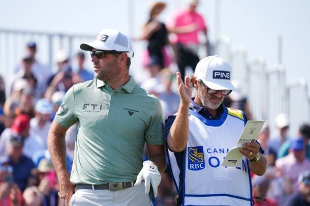 RBC Canadian Open 2025 - Round Three CALEDON, CANADA - JUNE 7 : Corey Conners of Canada talks with his caddie Danny Sahl before playing his shot from the 1st tee during the third round of the RBC Canadian Open 2025 at TPC Toronto at Osprey Valley in Caledon, Ontario, Canada on June 7, 2025. Mert Alper Dervis Anadolu Ontario Canada. Editorial use only. Please get in touch for any other usage.  Copyright: x2025xAnadoluxMertxAlperxDervisx