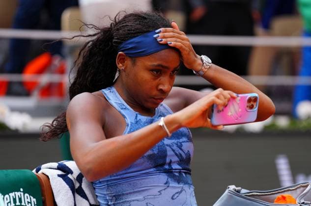 Coco Gauff prepares for the trophy ceremony by fixing her hair with the use of her i-phone French Open Tennis, Day Fourteen, Tennis, Roland Garros, Paris, France - 07 Jun 2025 EDITORIAL USE ONLY No use with unauthorised audio, video, data, fixture lists, club league logos or live services. Online in-match use limited to 120 images, no video emulation. No use in betting, games or single club league player publications. Copyright: xJavierxGarcia Shutterstockx 15346223ah