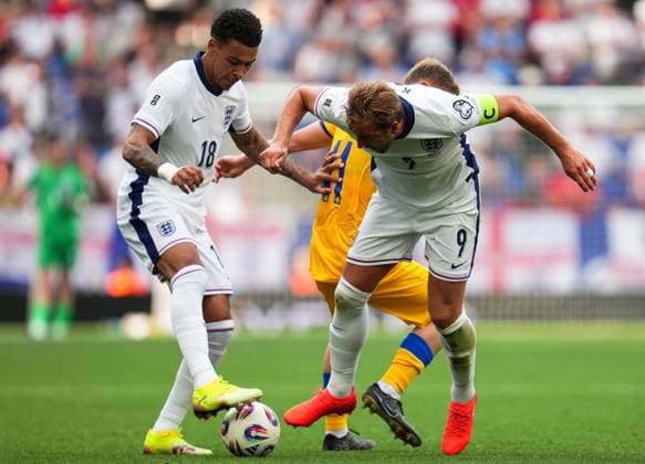 Harry Kane of England (R) and Morgan Rogers of England (L) battle for possession with Pau Babot of Andorra (centre) Andorra v England, FIFA 2026 World Cup Qualifying, Group K, Football, RCDE Stadium, Barcelona, Spain - 07 Jun 2025 EDITORIAL USE ONLY No use with unauthorised audio, video, data, fixture lists, club league logos or live services. Online in-match use limited to 120 images, no video emulation. No use in betting, games or single club league player publications. Copyright: xBaguxBlanco Shutterstockx 15345797bi