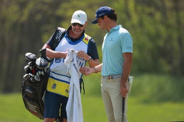 RBC Canadian Open 2025 at TPC Toronto at Osprey Valley CALEDON, ONTARIO - JUNE 07: Jackson Suber of Tampa, Florida waits for his caddie to finish cleaning his ball on the first green during the third round of the RBC Canadian Open 2025 at TPC Toronto at Osprey Valley on June 07, 2025 in Caledon, Ontario, Canada. Caledon Ontario United States  Copyright: xAmyxLemusx originalFilename:lemus-rbccanad250607_npg76.jpg