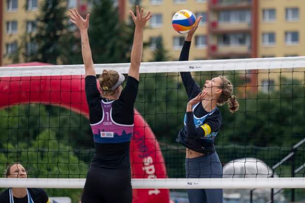 Hanna-Marie Schieder of Germany, left, and Anna Pavelkova of Czech Republic in action during the quarterfinal women double match Katerina Pavelkova and Anna Pavelkova of Czech Republic vs Hanna-Marie Schieder and Karla Borger of Germany at the Pro Tour Futures Beach volleyball, Beachvolleyball tournament in Prague, Czech Republic, June 7, 2025. (CTKxPhoto OndrejxDeml) CTKPhotoP2025060704822  CTKPhotoP2025060704822
