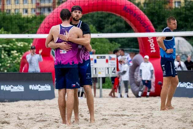 Jiri Sedlak, left, and Jakub Sepka of Czech Republic reacts as they play against Tomas Semerad and Adam Miroslav Stocek of Czech Republic during their quarterfinal men double match at the Pro Tour Futures Beach volleyball, Beachvolleyball tournament in Prague, Czech Republic, June 7, 2025. (CTKxPhoto OndrejxDeml) CTKPhotoP2025060705078  CTKPhotoP2025060705078