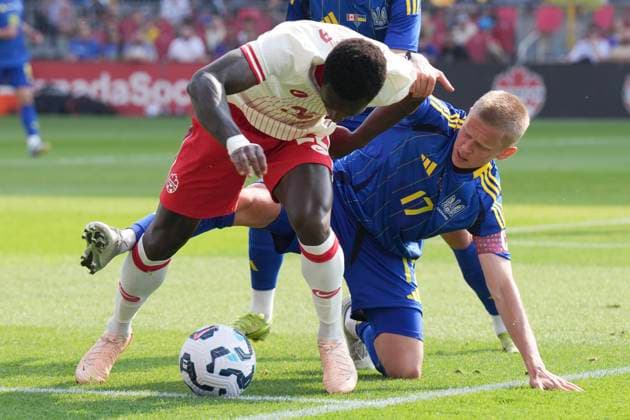 June 7, 2025, Toronto, On, CAN: Canada s Richie Laryea, left, battles for the ball with Ukraine s Oleksandr Zinchenko during second half Canadian Shield Tournament action, in Toronto, on Saturday, June 7, 2025. Canada S Richie Laryea; Oleksandr Zinchenko - ZUMAc35_ 20250607_zaf_c35_105 Copyright: xChrisxYoungx