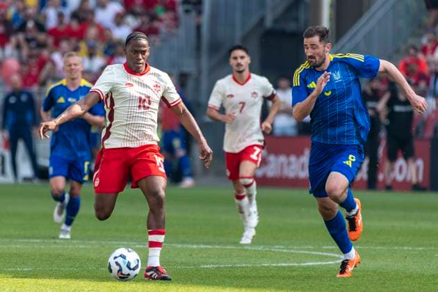 June 7, 2025, Toronto, Ontario, Canada: Jonathan David 10 (L) battles for the ball against Ivan Kalyuzhnyi 6 (R) during the Canadian Shield Tournament match at BMO Field on June 7, 2025 in Toronto, Ontario, Canada. The game ended 4-2 for Canada Toronto Canada - ZUMAm154 20250607_zap_m154_048 Copyright: xAngelxMarchinix